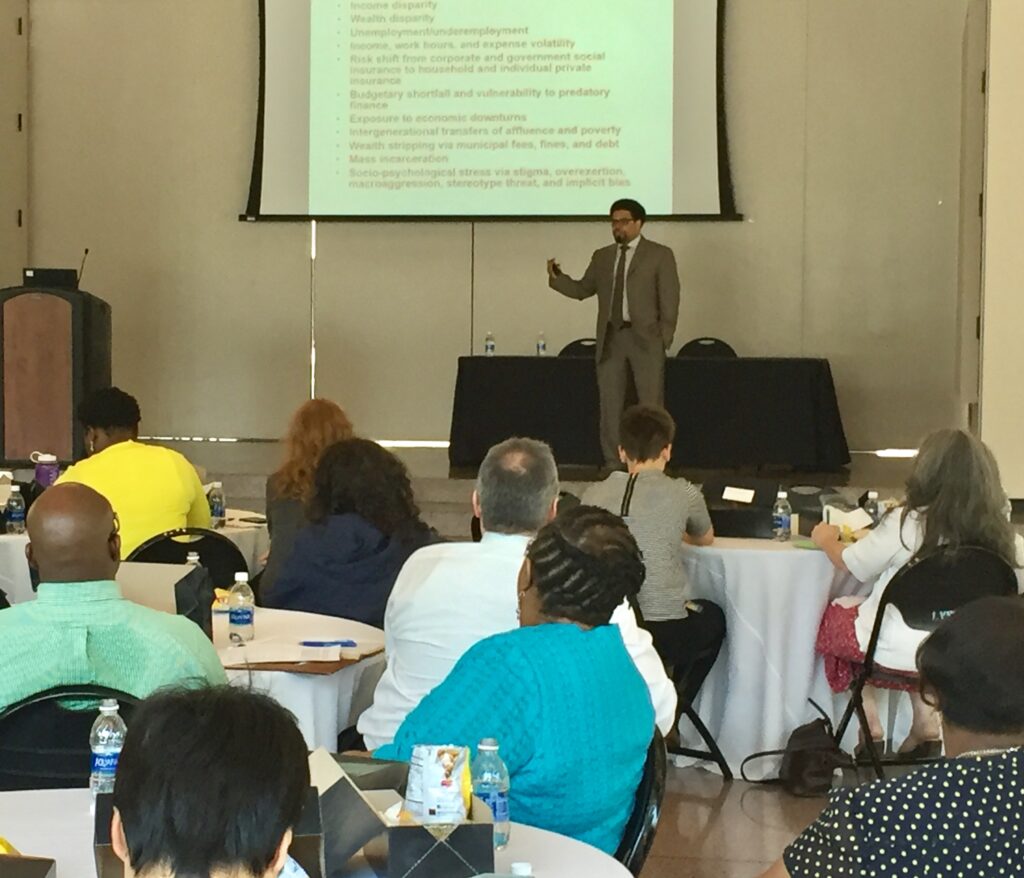 Darrick Hamilton speaking on campus